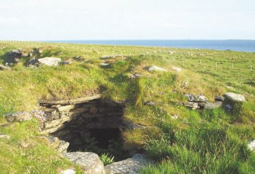 Ruins of the Iron Age broch on Lamb Head, Stronsay