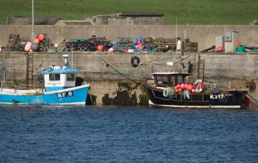 Two fishing boats, signs of the history and heritage of the fishing in Stronsay