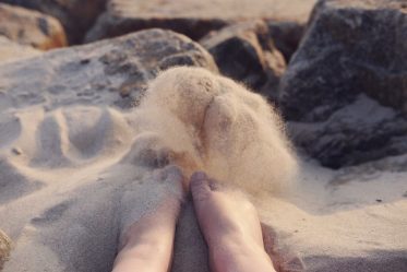 Child's feet in the sand